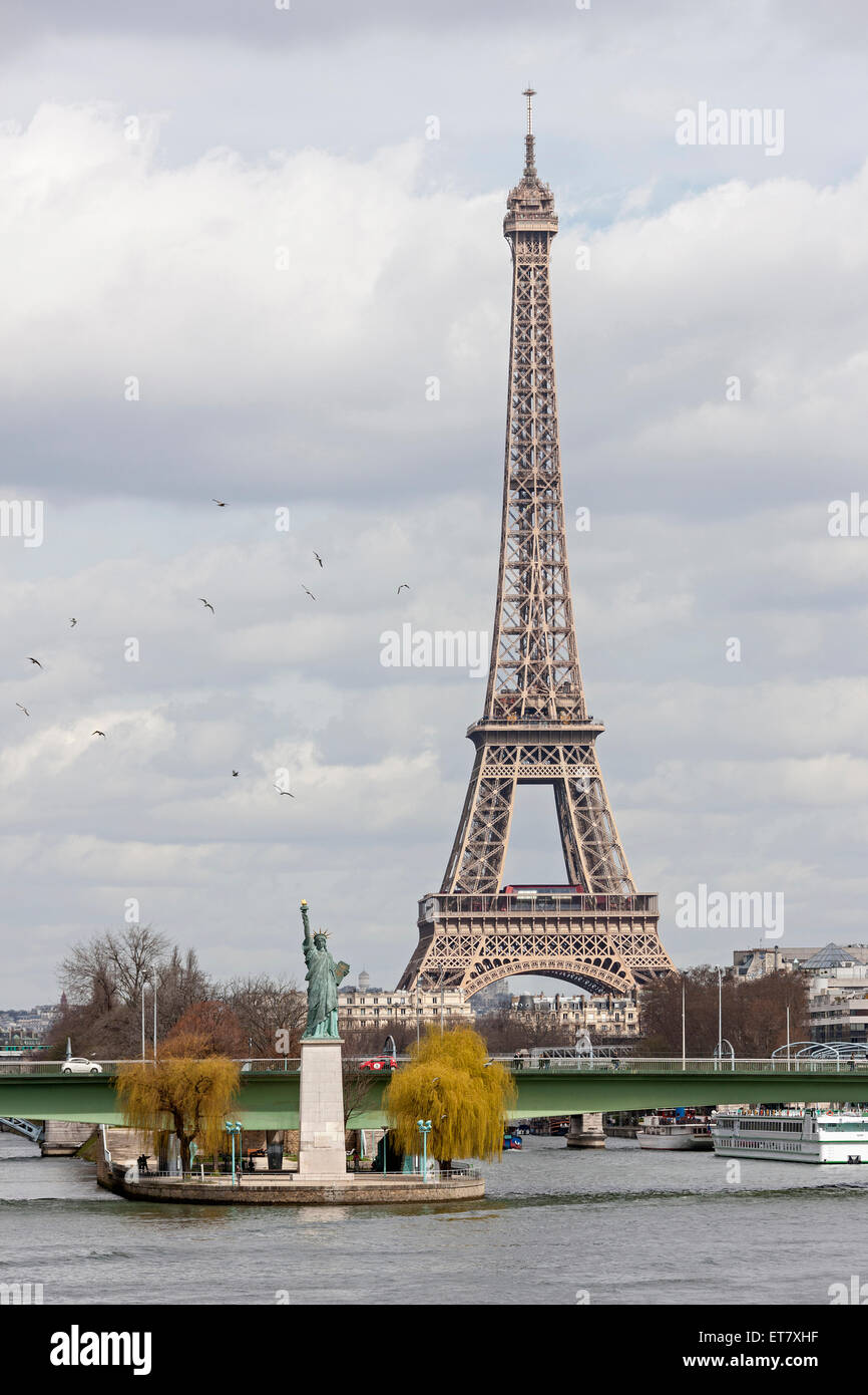 Replica of Statue of Liberty near Pont Grenelle with Eiffel Tower in