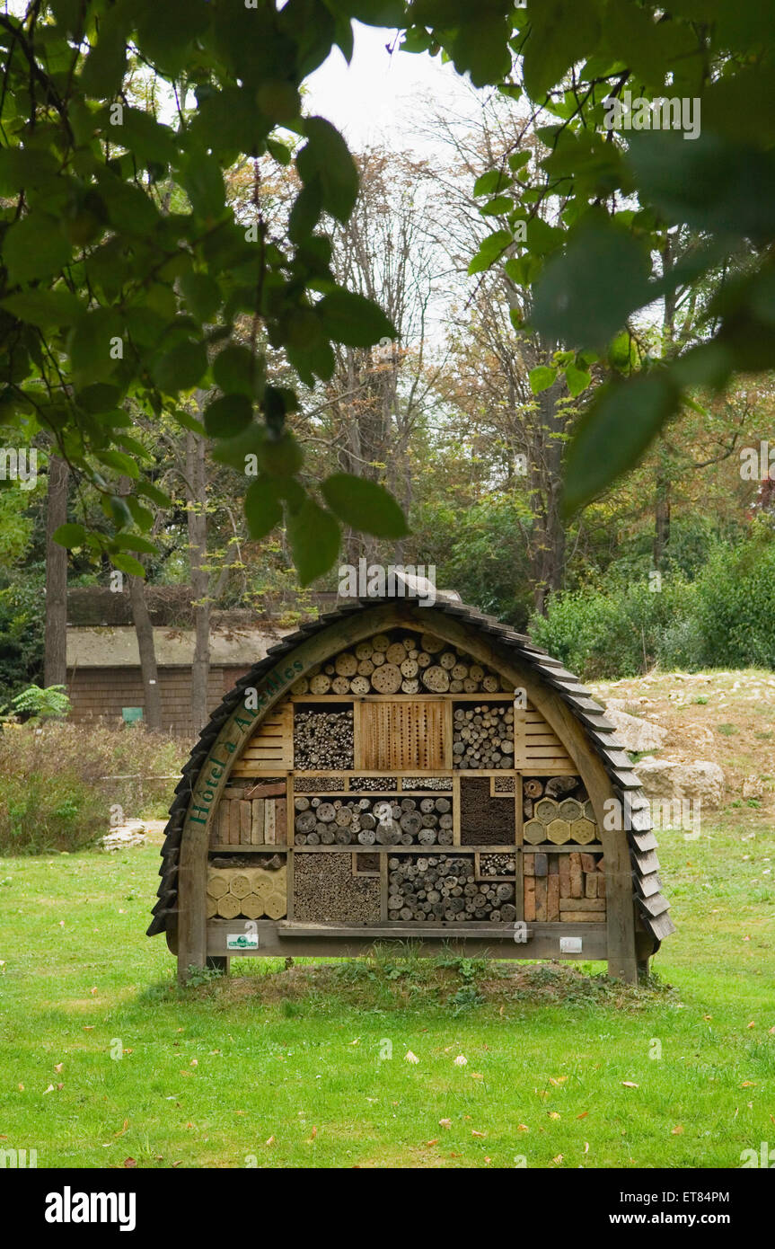 Insect home (or bug hotel) in wildlife garden - Paris, France. Stock Photo