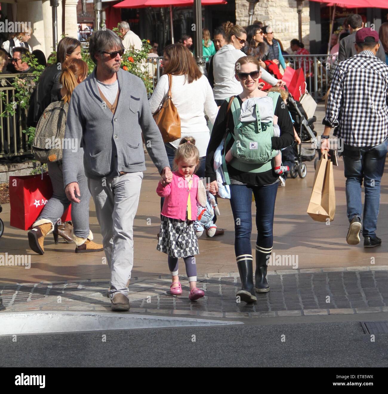 The Killing star, Mireille Enos with husband Alan Ruck take their family Christmas shopping at The Grove in Hollywood  Featuring: Mireille Enos, Alan Ruck, Vesper Vivianne Ruck, Sam Ruck Where: Los Angeles, California, United States When: 21 Dec 2014 Credit: WENN.com Stock Photo