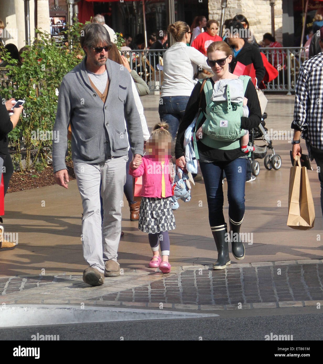 The Killing star, Mireille Enos with husband Alan Ruck take their family Christmas shopping at The Grove in Hollywood  Featuring: Mireille Enos, Alan Ruck, Vesper Vivianne Ruck, Sam Ruck Where: Los Angeles, California, United States When: 21 Dec 2014 Credit: WENN.com Stock Photo