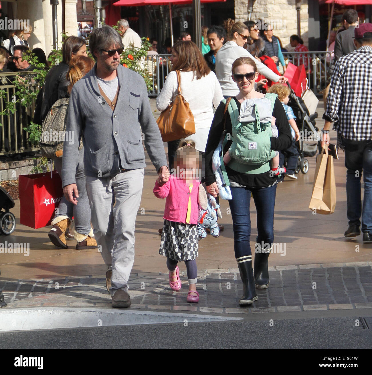 The Killing star, Mireille Enos with husband Alan Ruck take their family  Christmas shopping at The Grove in Hollywood Featuring: Mireille Enos, Alan  Ruck, Vesper Vivianne Ruck, Sam Ruck Where: Los Angeles,