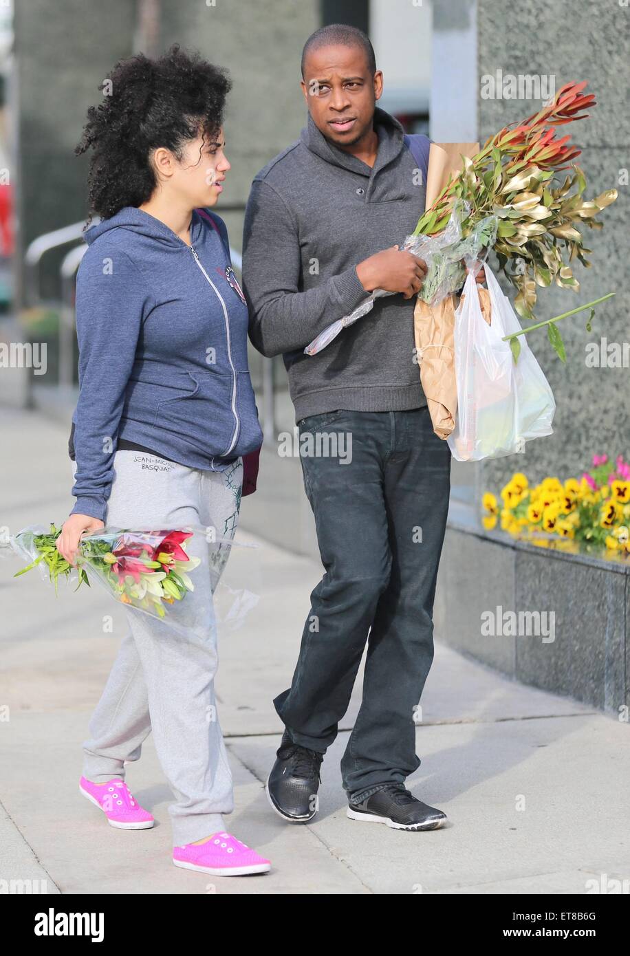 Keith Powell and his wife, Jill Knox purchase flowers from the Farmer's(02)