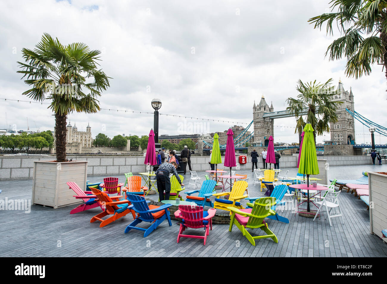 London Riviera Pop Up Restaurant Next To City Hall In London With Colourful Deck Chairs And Fake 