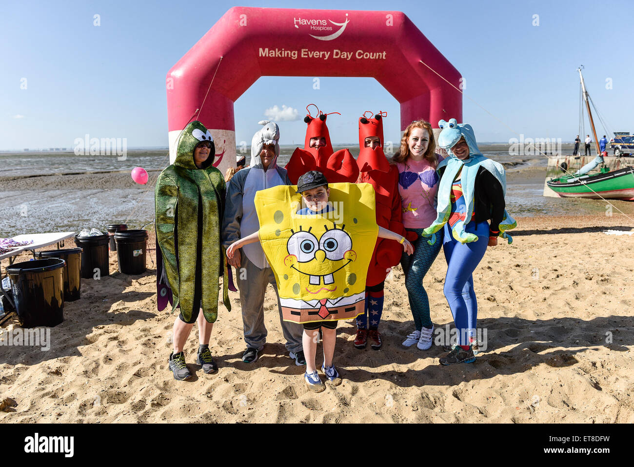 Competitors in fancy dress before the start of the annual 'Island to Island Mud Run'. Stock Photo