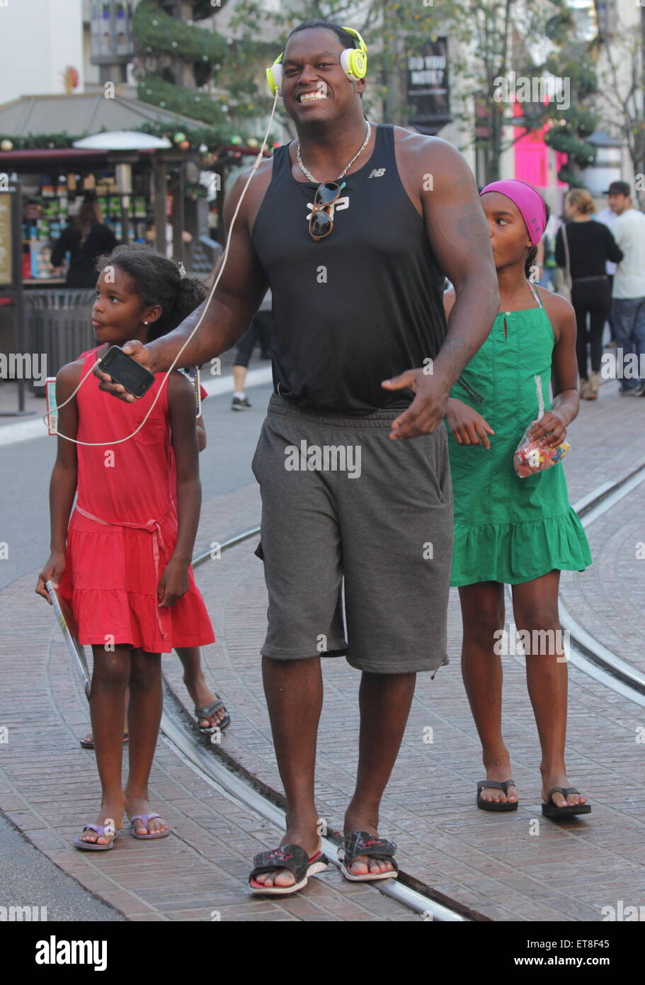 LaVar Arrington shops at The Grove with his family Featuring: LaVar