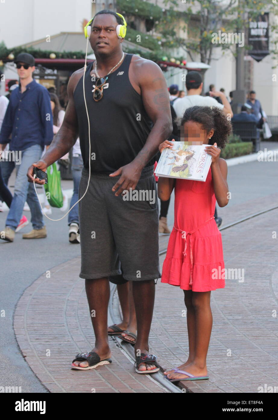 LaVar Arrington shops at The Grove with his family Featuring: LaVar