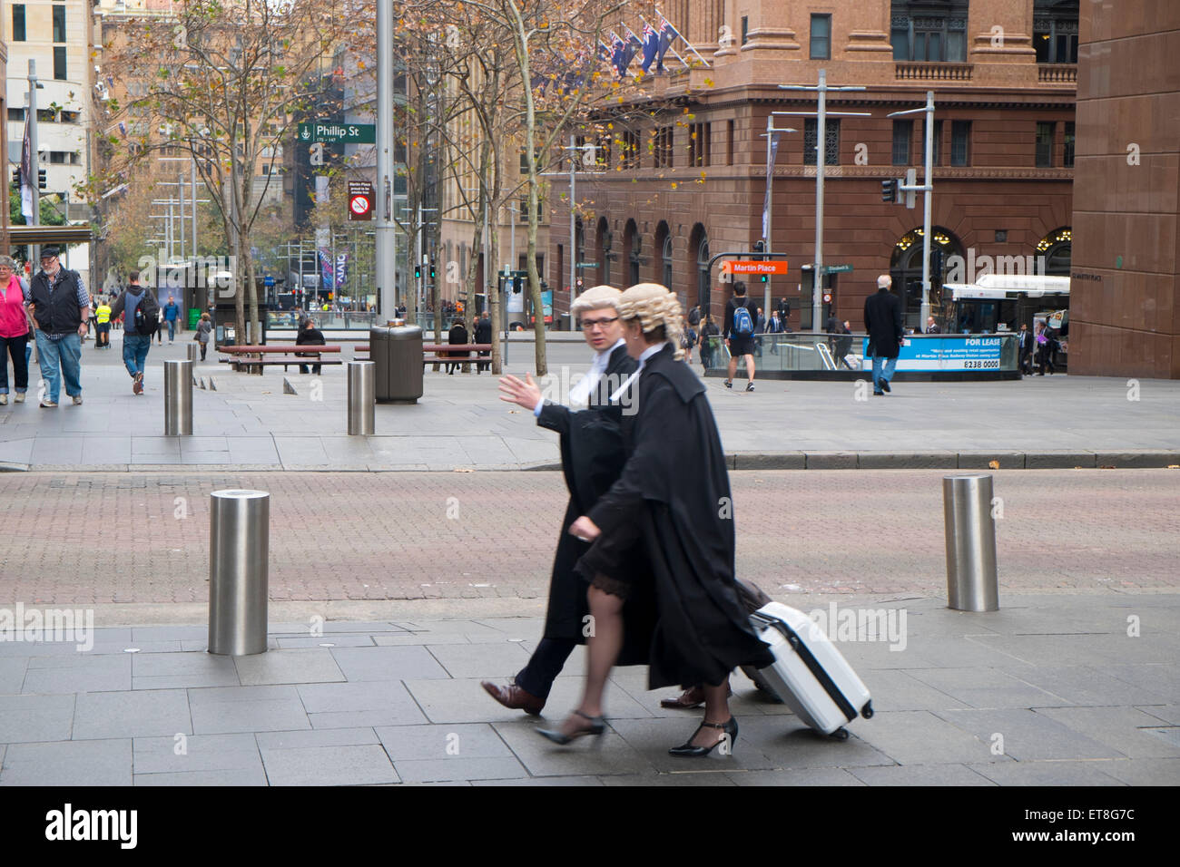 Two sydney lawyers barristers walking through Sydney city centre on way to court, new south wales,australia Stock Photo