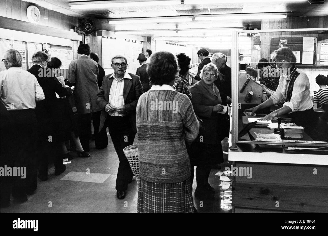 Customers at a betting shop. 5th June 1979. Stock Photo