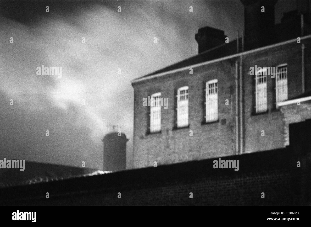 Firemen tackle a blaze in the library at Chelmsford Prison. 20th March 1978. Stock Photo