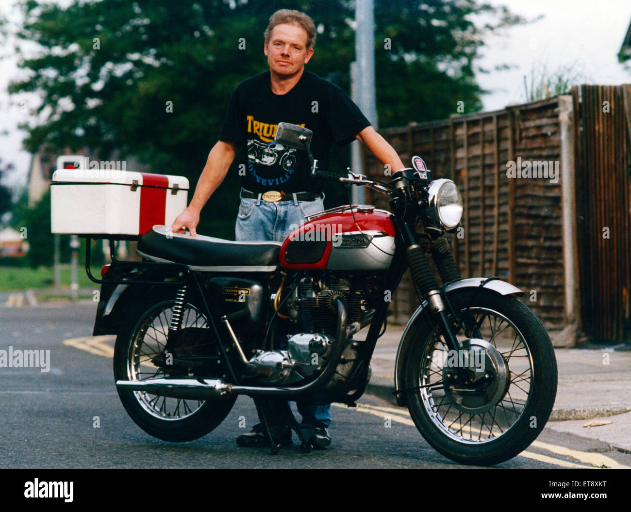 Stuart is pictured with the 1968 Triumph Trophy 650 Twin which he hopes will be joined by other classic Triumphs in the new club. 1st August 1992. Stock Photo