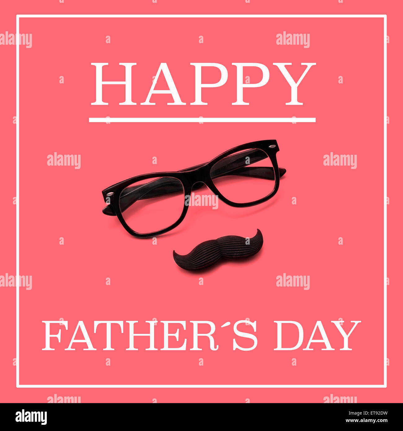 the sentence happy fathers day, and a pair black eyeglasses and a