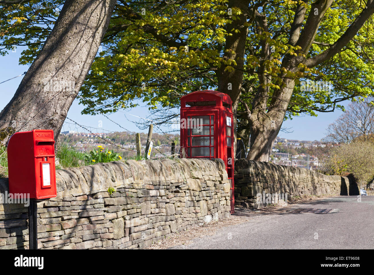 Rural post box and telephone box, Norland, West Yorkshire Stock Photo