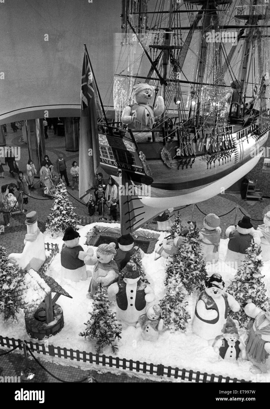 A replica of Captain Cook's ship 'Endeavour' hanging in the Cleveland Centre above some Christmas decorations. 24th November 1988. Stock Photo