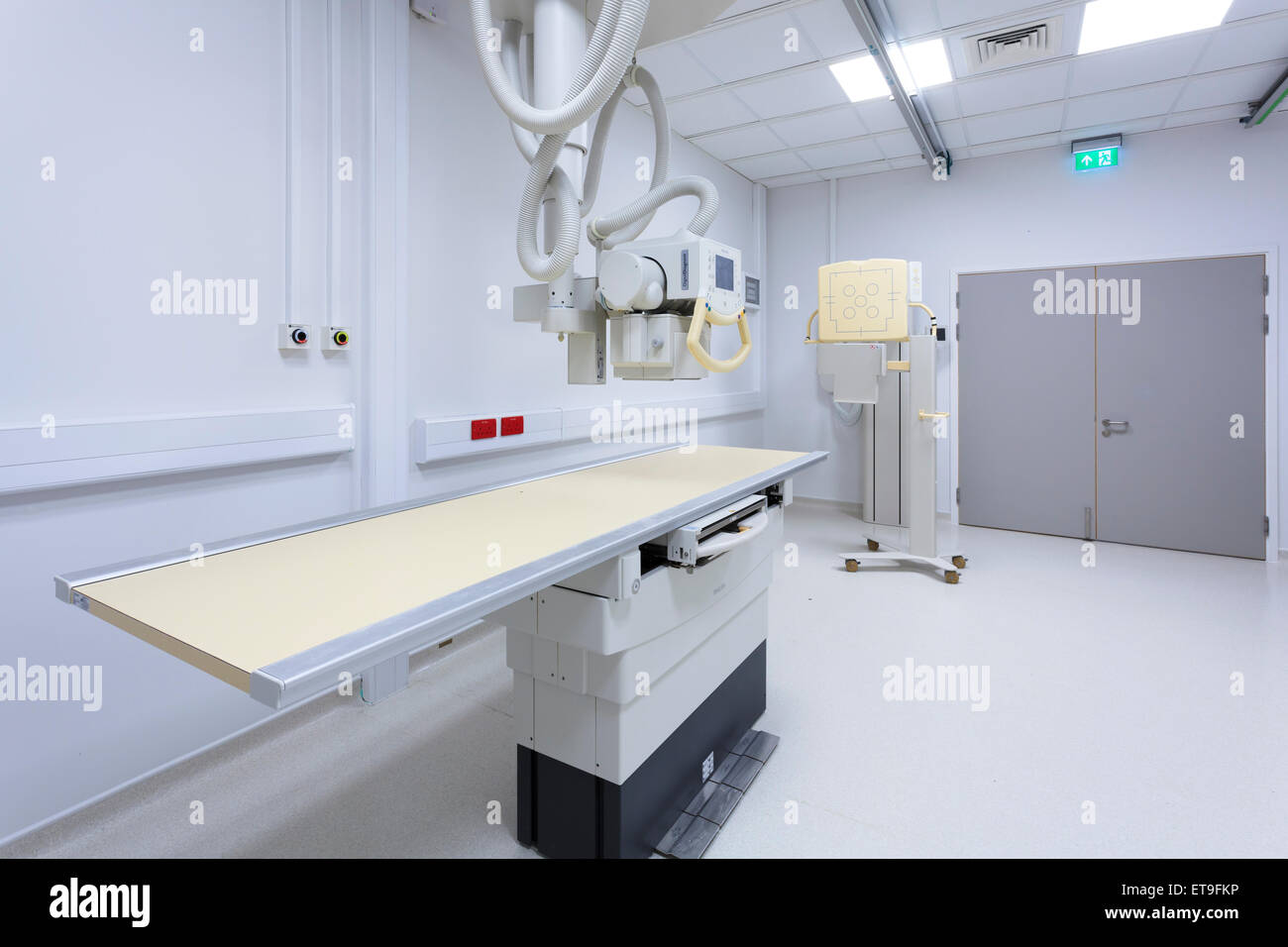 Hospital X-Ray machine and table without people Stock Photo
