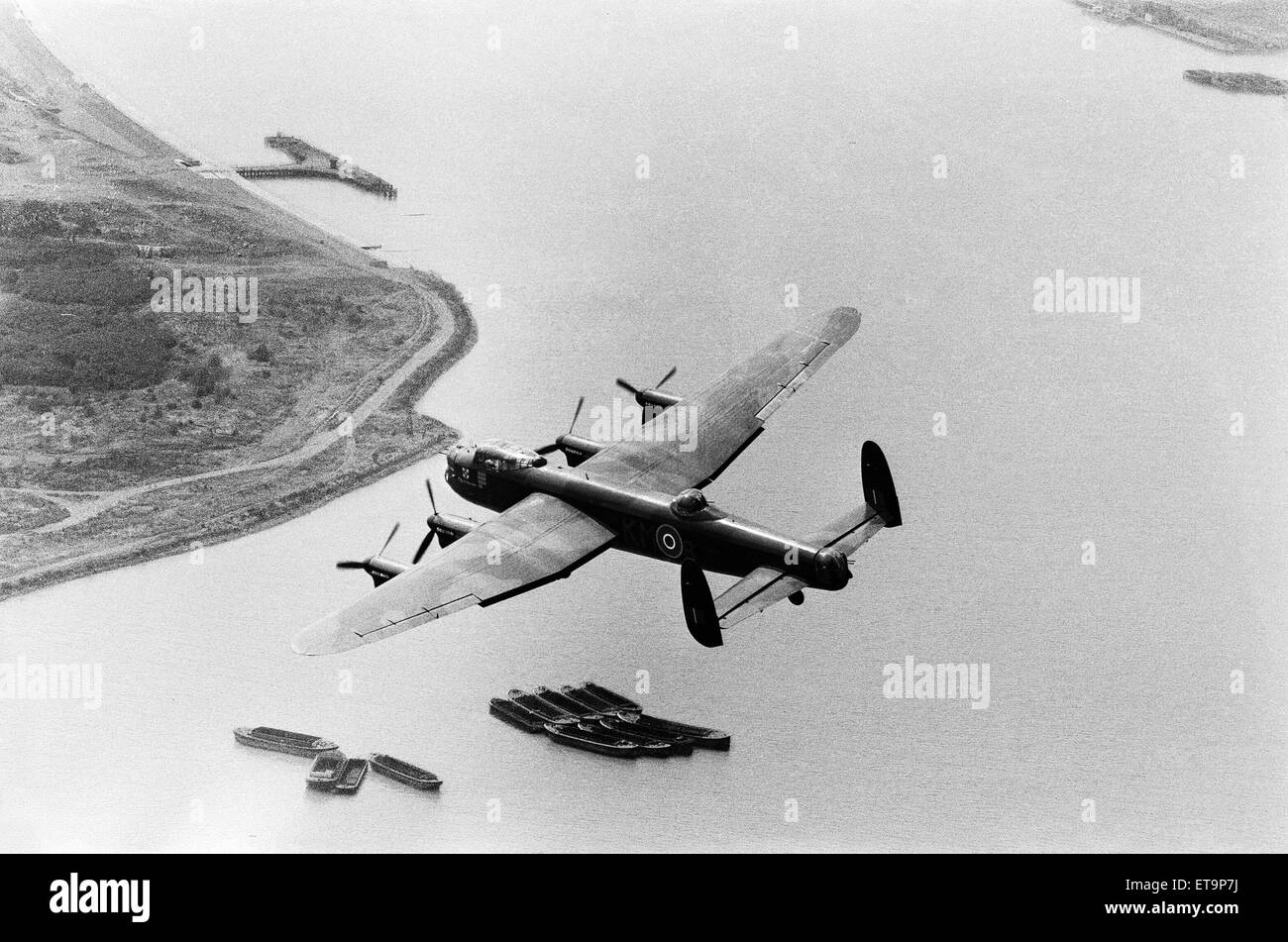 The RAF' s only Lancaster bomber pictured in flight over Central London. 11th July 1976. Stock Photo