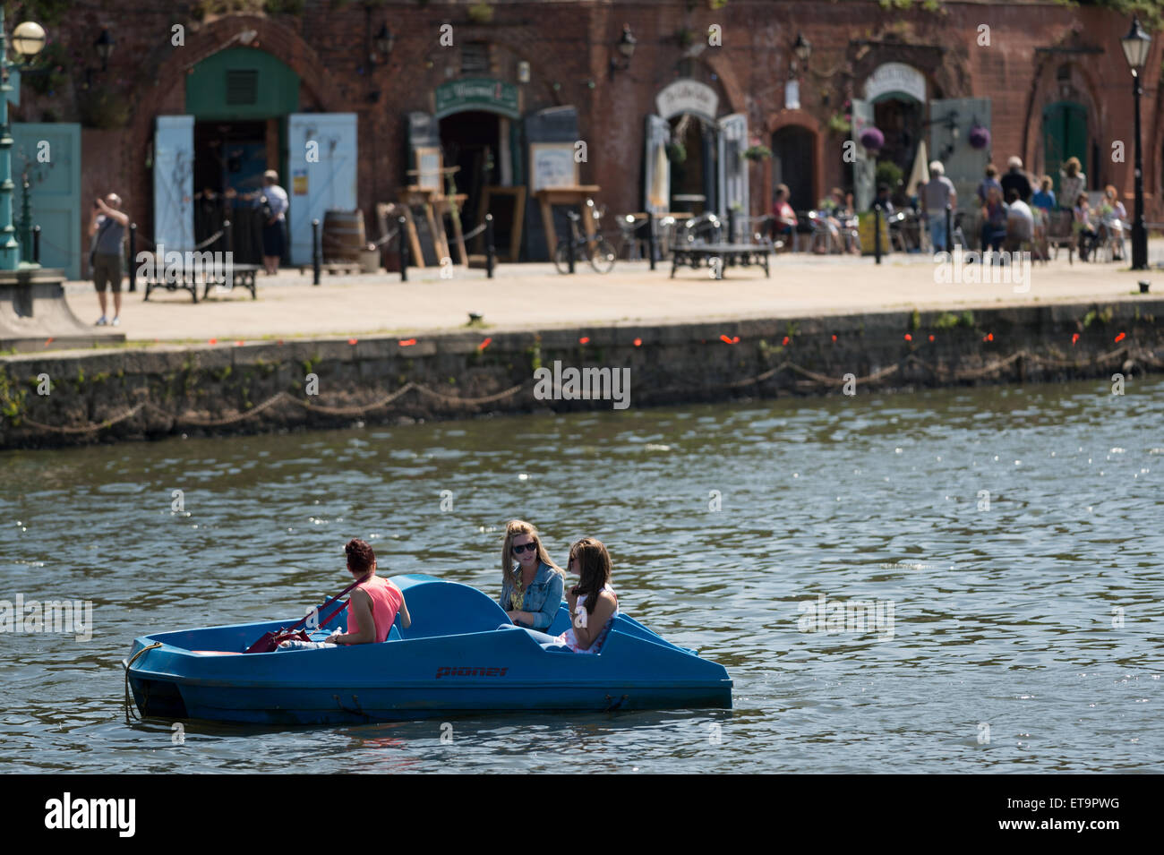 Girls in a pedalo in Exeter Quay, Devon, UK Stock Photo Alamy