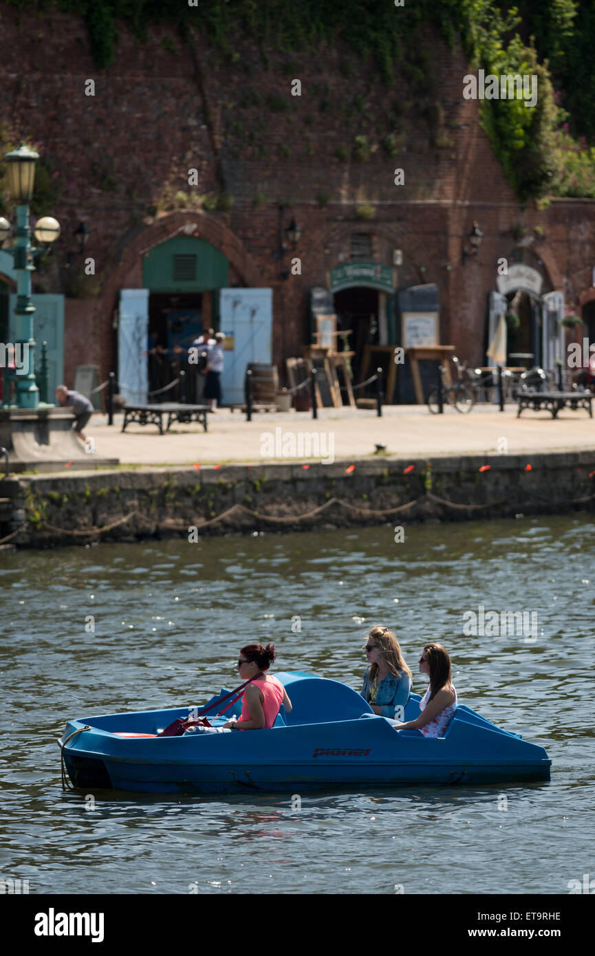Girls in a pedalo in Exeter Quay, Devon, UK Stock Photo Alamy