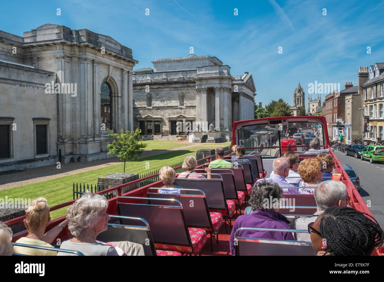 Tourists on open top city sightseeing bus near Fitzwilliam Museum, Trumpington Street, Cambridge, England UK Stock Photo