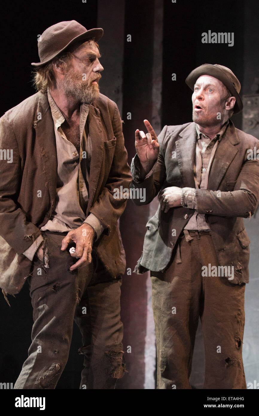 L-R: Hugo Weaving as Vladimir and Richard Roxburgh as Estragon. Actors Richard Roxburgh and Hugo Weaving star in Samuel Beckett's 'Waiting for Godot' at the Barbican Theatre. Part of the International Beckett Season, this Sydney Theatre Company play is directed by Andrew Upton. With Luke Mullins as Luke, Philip Quast as Pozzo, Richard Roxburgh as Estragon and Hugo Weaving as Vladimir. Performances from 4 to 13 June 2015 at the Barbican Theatre. Stock Photo