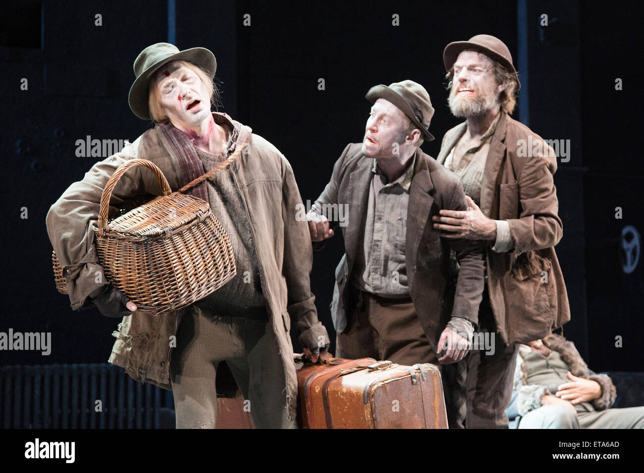 L-R: Luke Mullins as Lucky, Richard Rockburgh as Estragon and Hugo Weaving as Vladimir. Actors Richard Roxburgh and Hugo Weaving star in Samuel Beckett's 'Waiting for Godot' at the Barbican Theatre. Part of the International Beckett Season, this Sydney Theatre Company play is directed by Andrew Upton. With Luke Mullins as Luke, Philip Quast as Pozzo, Richard Roxburgh as Estragon and Hugo Weaving as Vladimir. Performances from 4 to 13 June 2015 at the Barbican Theatre. Stock Photo