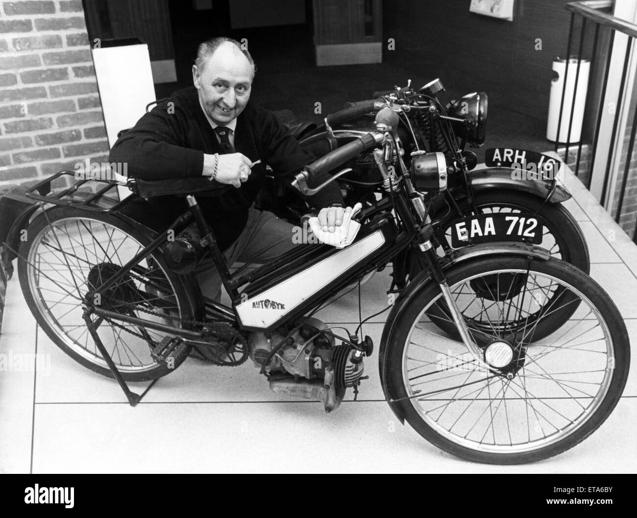 They don't build 'em like that anymore! The 1941 Excelsior 98cc Autobyk, pictured being given a polish by Billingham art gallery senior attendant Robert Chapman, is the latest two-wheeled acquisition by Stockton Council's museums,. 6th January 1988. Stock Photo
