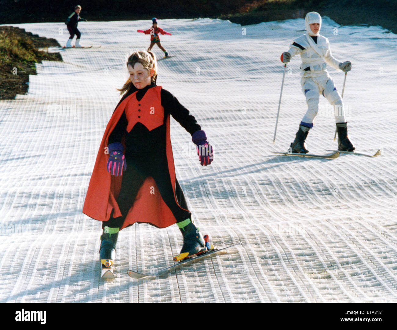 Children at Eston Ski School added a halloween flavour to their practise sessions. They combined two of their favourite things; skiing and dressing up. 31st October 1992. Stock Photo