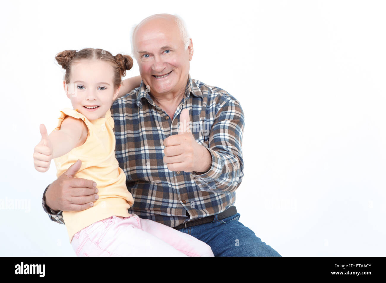 Grandfather with his grand daughter Stock Photo