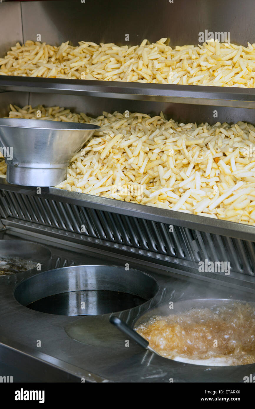 kitchen-where-french-fried-potato-chips-are-being-cooked-stock-photo