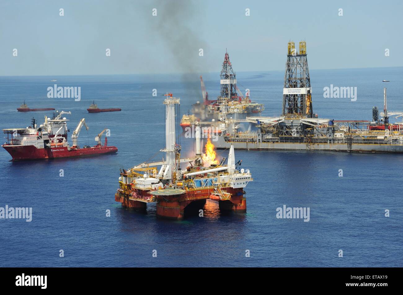 The drill ship Discover Enterprise continues to capture oil and burn off gases from the ruptured