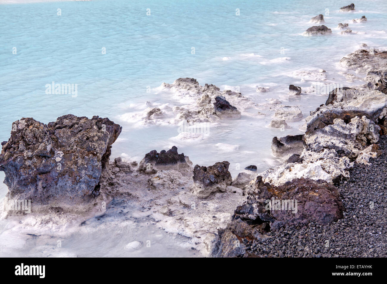 Rocks and warm waters rich in minerals like silica and sulfur in the