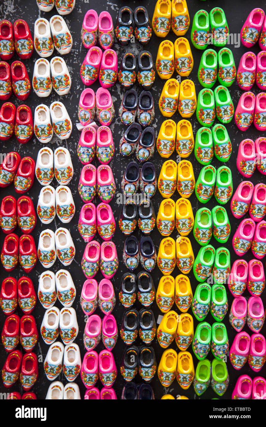 wooden shoes in many colors for sale in amsterdam souvenir shop Stock Photo Alamy