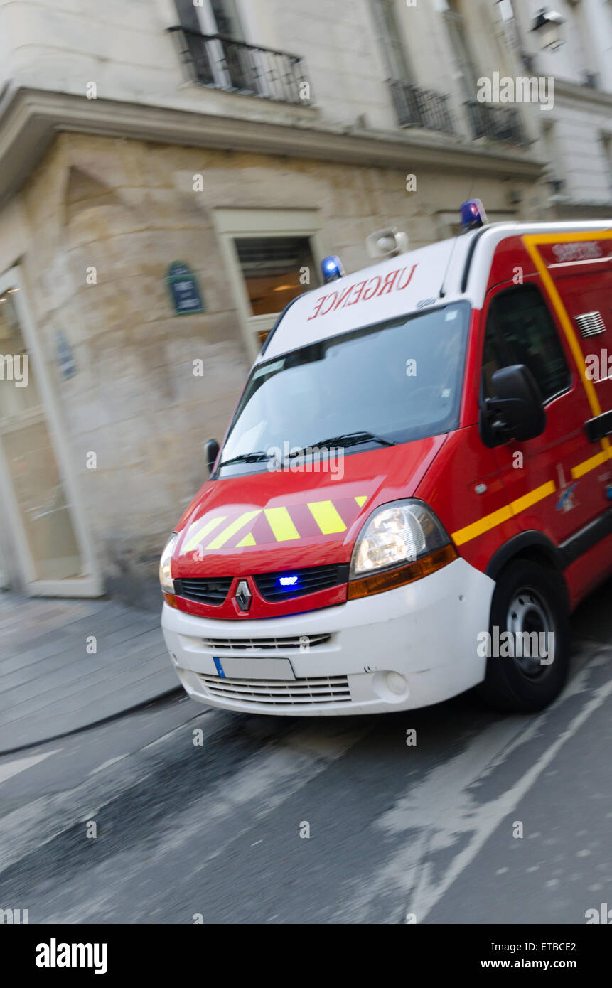 Government fire department red truck in the street of Paris, France Stock Photo