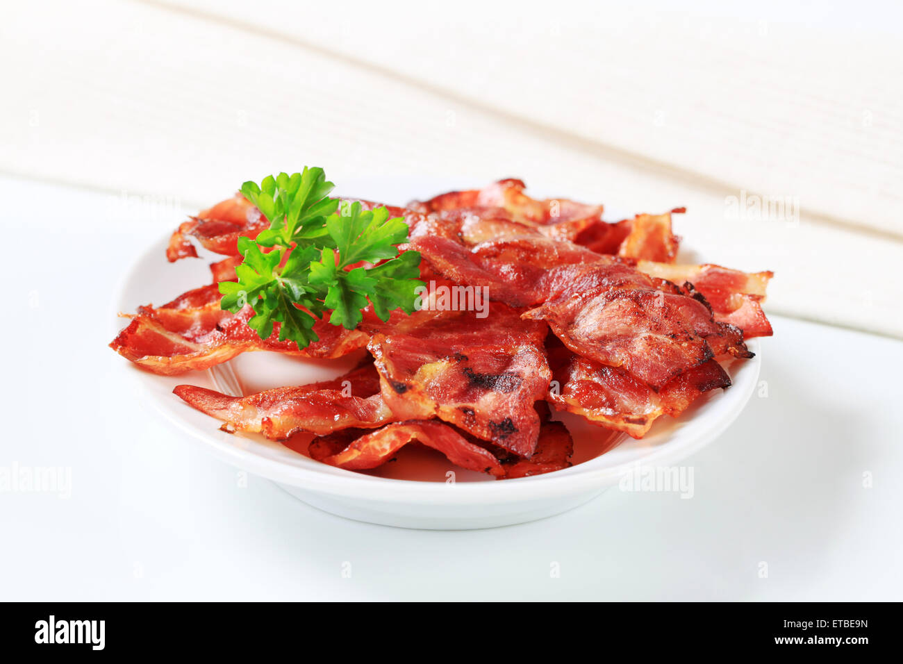Crispy rashers of streaky bacon Stock Photo