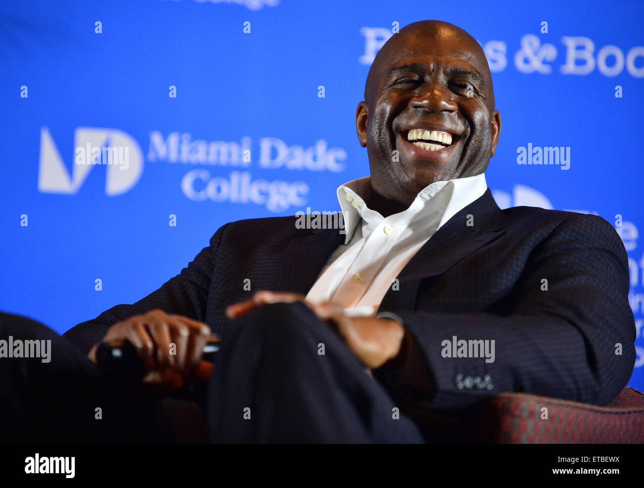 Mike Fernandez is joined by NBA legend Magic Johnson at a presentation