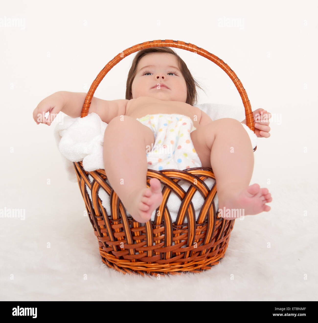 happy baby in basket on white Stock Photo Alamy