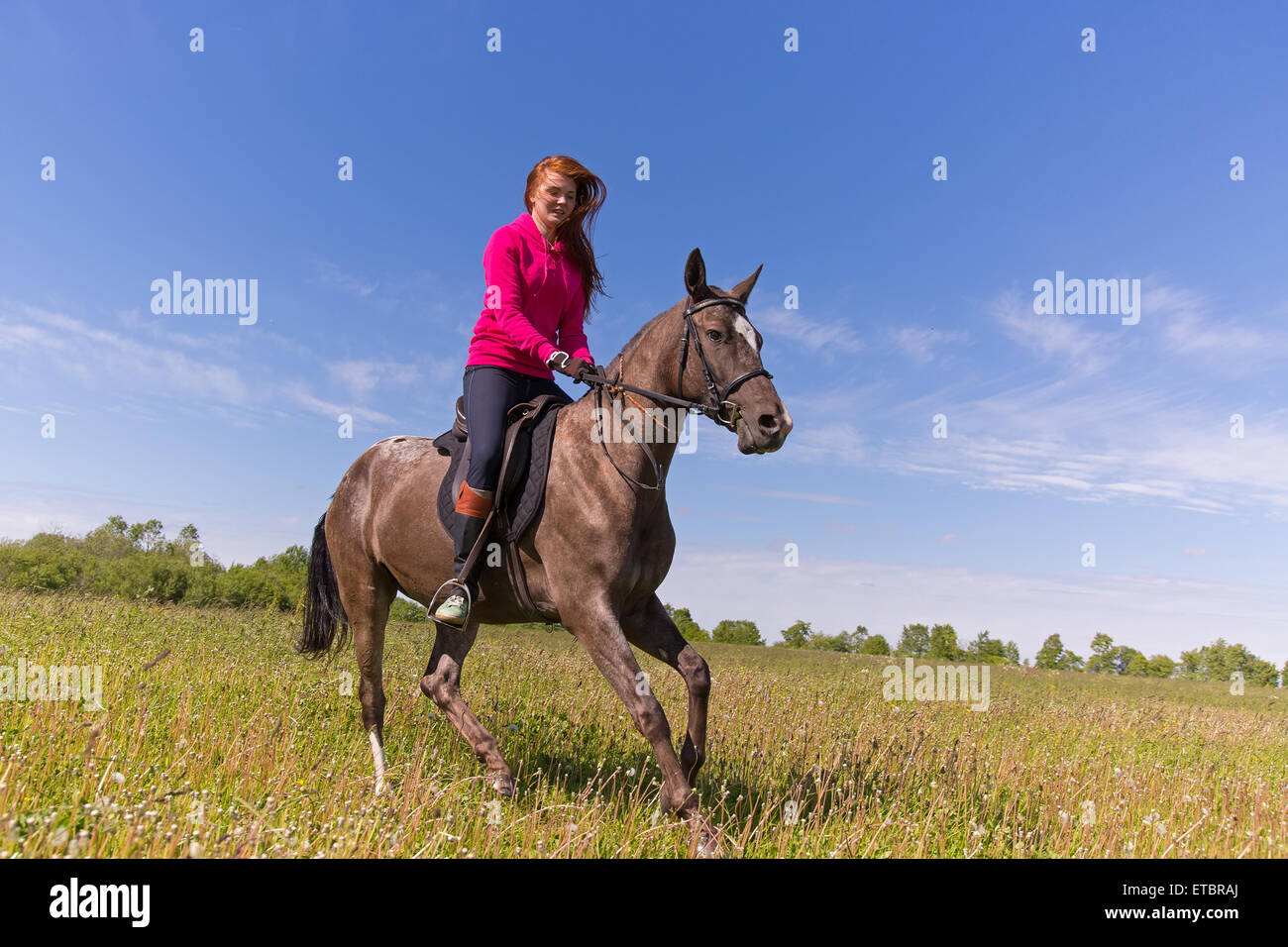 Redhead Girl Riding Horse High Resolution Stock Photography and Images