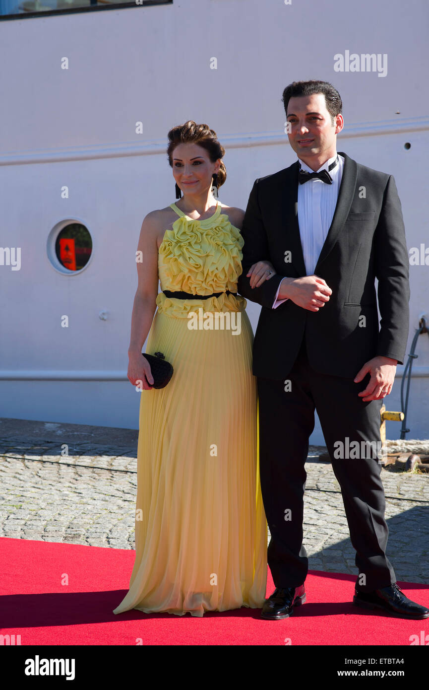Stockholm, Sweden, June, 12, 2015. Private guests arrives at Strandvagen, Stockholm to board the Archipelago ship s/s Stockholm for further transport to the festivities. This is the start of the celebration of the marriage between Prince Carl Philip and Ms Sofia Hellqvist that will take place tomorrow at the Royal Chapel, Stockholm.  Mrs Christina Saliba, media adviser and Mr Elias Saliba. Credit:  Barbro Bergfeldt/Alamy Live News Stock Photo