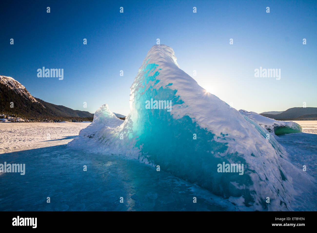 The Sun Shines Through An Iceberg On Juneaus Frozen Mendenhall Glacier