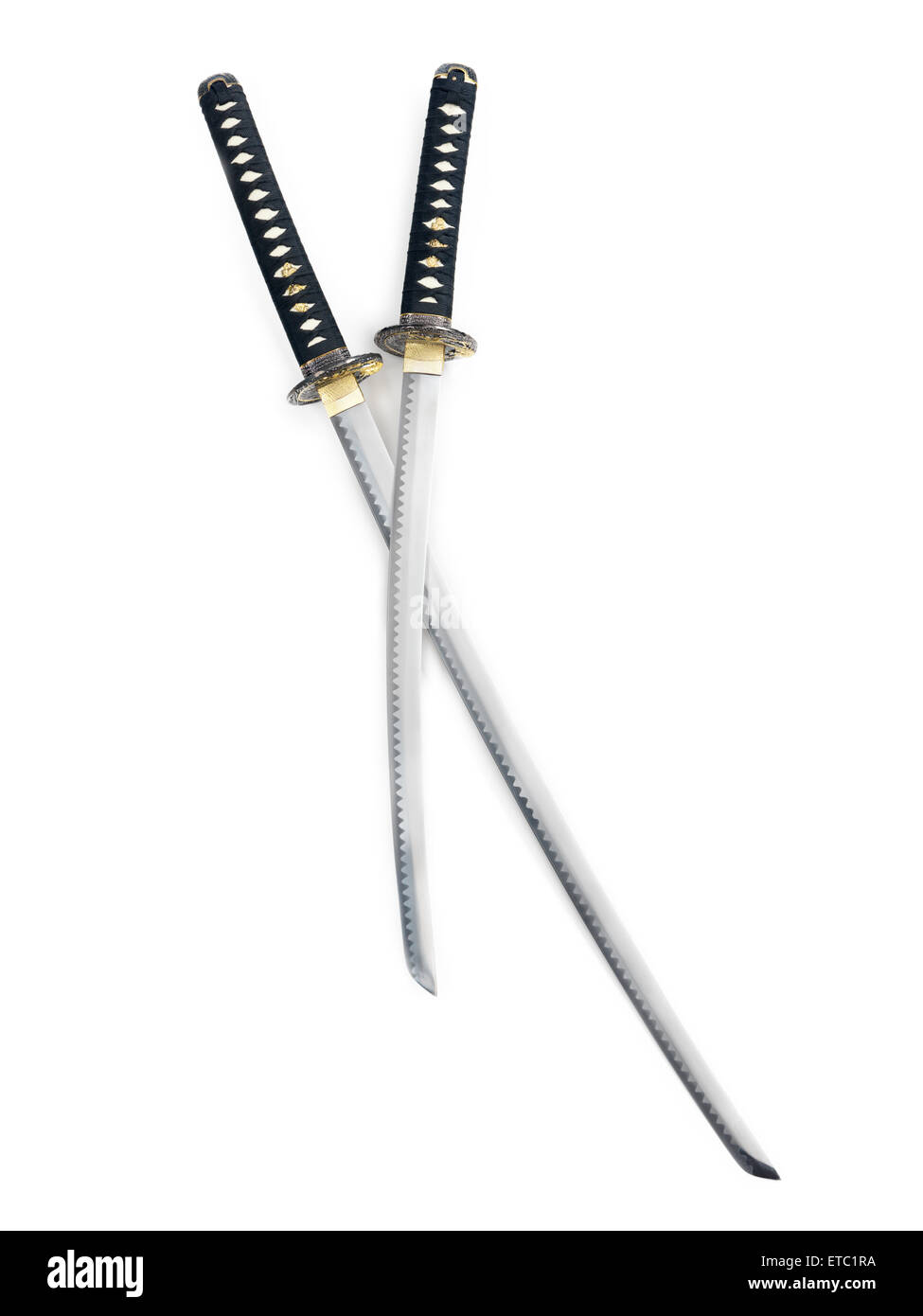 Two crossed Japanese samurai swords, Katana and Wakizashi isolated on white background Stock Photo