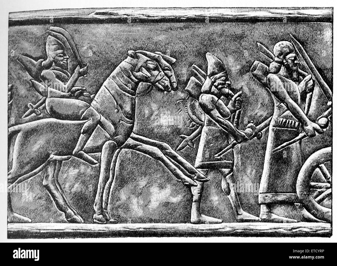 This bas-relief shows an Assyrian horseman armed with a sword. It was drawn by Faucher-Gudin in the early 20th century, from a bas-relief in bronze on the gate of Balawat. The original bronze relief decorated the gate at the palace of the Assyrian ruler Shalmanesar III (c. 859–824 B.C.) at Balawat in present-day northern Iraq. Here, the Assyrian artist has shown the head and legs of the second horse in profile behind the first, but he has forgotten to represent the rest of its body, and also the man riding it. Stock Photo