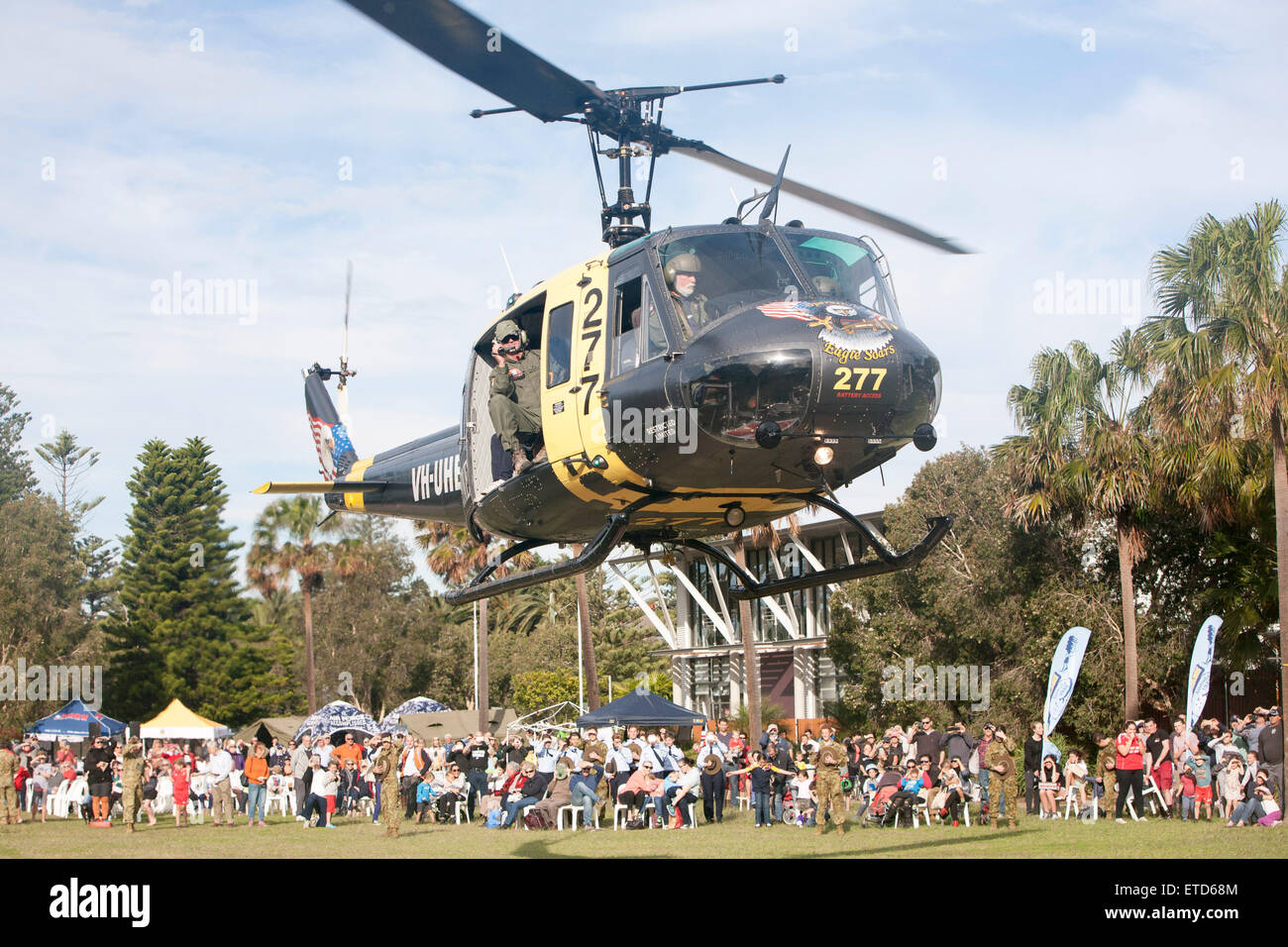 Sydney, Australia. 13th June, 2015. 10th Avalon Beach Military Tattoo featured the Bell UH-1 Iroquois which is a military helicopter powered by a single turboshaft engine, with two-bladed main and tail rotors, the Huey Eagle One Vietnam helicopter seen here drew a large crowd of onlookers,Avalon Beach Sydney,australia, martinberry@alamylivenews Stock Photo