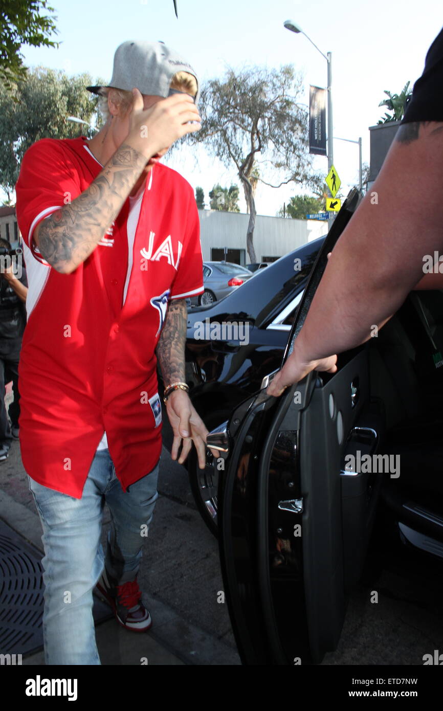 A camera-shy Justin Bieber and Hailey Baldwin eat lunch at Urth Cafe  Featuring: Justin Bieber Where: Los Angeles, California, United States  When: 21 Jan 2015 Credit: WENN.com Stock Photo - Alamy