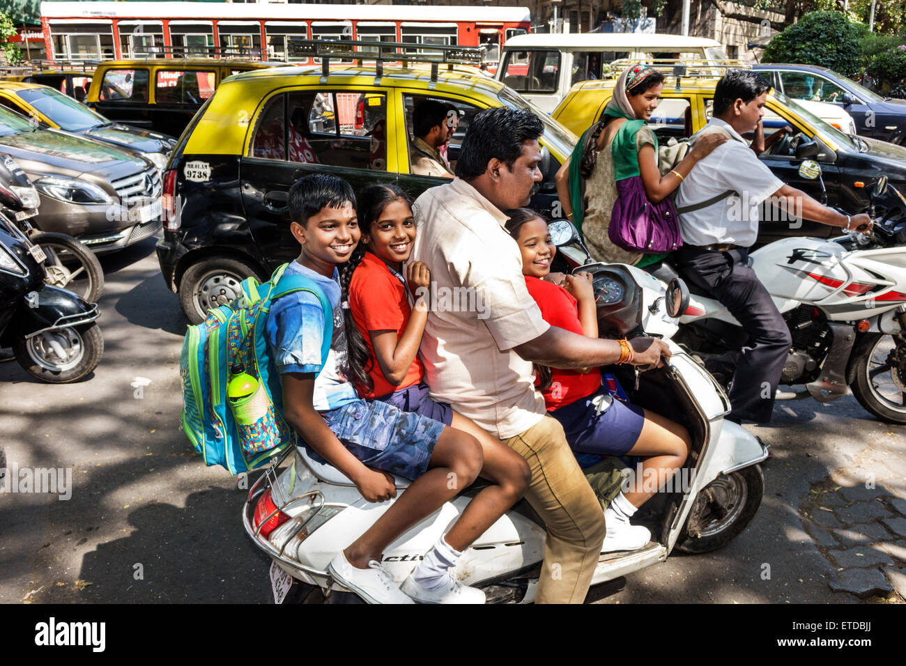 Mumbai India,Fort Mumbai,Mantralaya,Mahatma Gandhi Road,man men male,father,son,daughter,male boy boys kids children girl girls,female youngster,motor Stock Photo