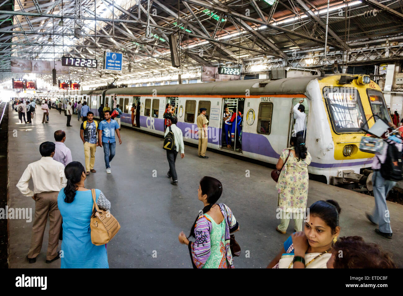 Mumbai India,Fort Mumbai,Chhatrapati Shivaji Central Railways Station Terminus Area,train,interior inside,man men male,woman female women,riders,commu Stock Photo