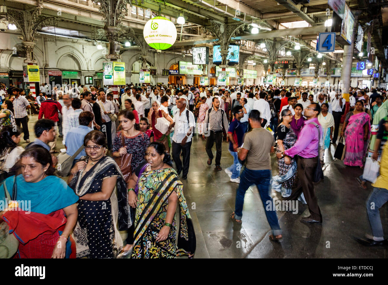 Mumbai India,Fort Mumbai,Chhatrapati Shivaji Central Railways Station Terminus Area,train,interior inside,man men male,woman female women,riders,commu Stock Photo