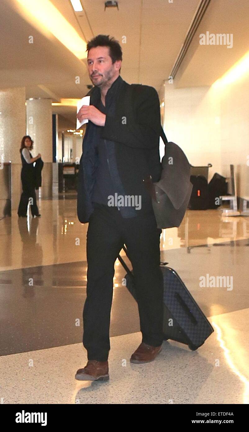Keanu Reeves departs from Los Angeles International Airport (LAX) carrying Louis  Vuitton luggage, Stock Photo, Picture And Rights Managed Image. Pic.  WEN-WENN22103807