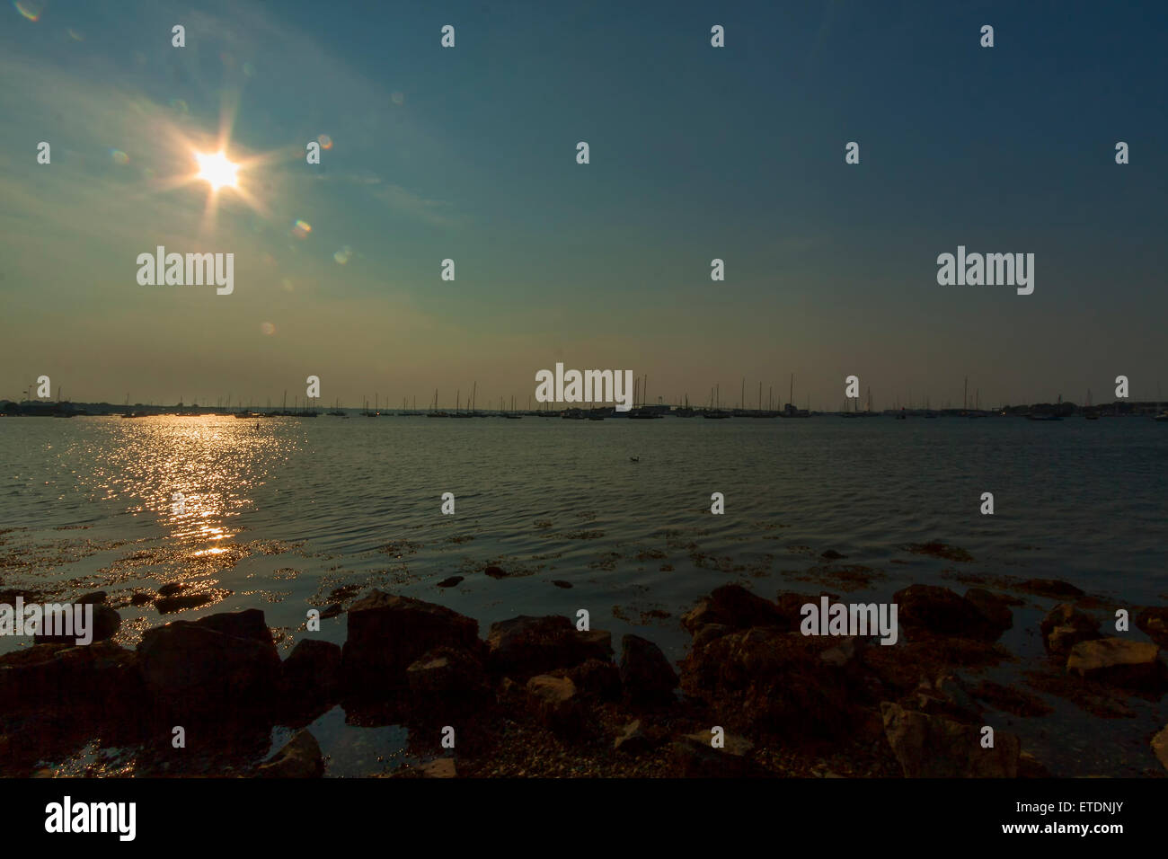 Rocky shore at sunset hi-res stock photography and images - Alamy