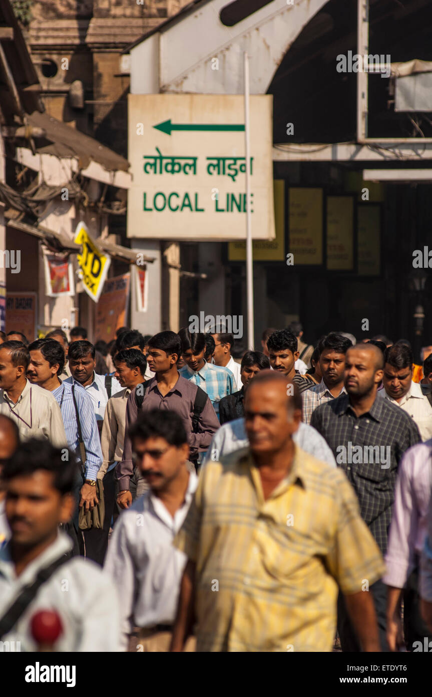 Indian commuters in the morning near Victoria Terminus, Mumbai, India Stock Photo