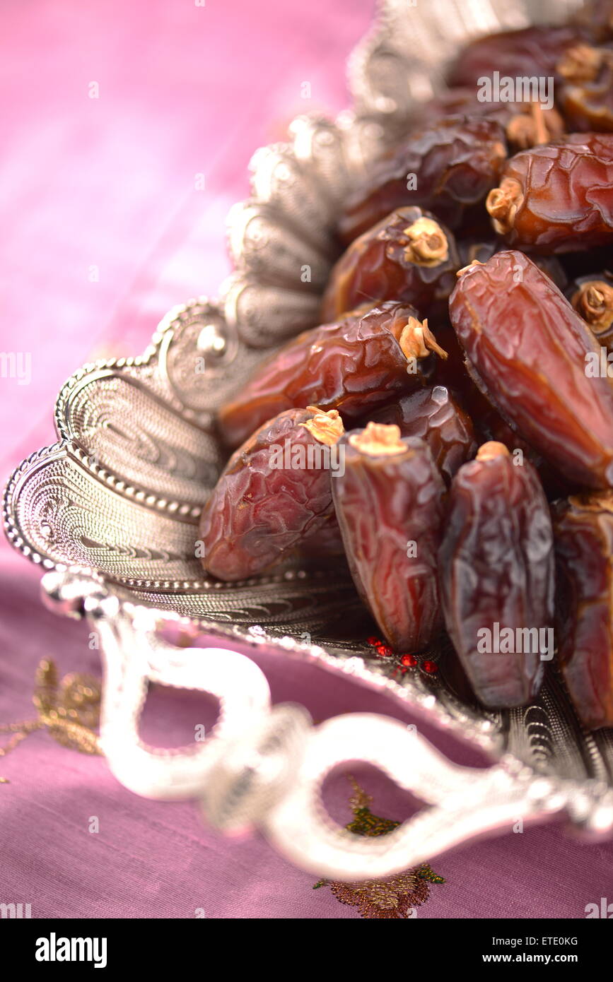 Best quality Mabroom dates in a vintage metal tray. Close up shot. Stock Photo