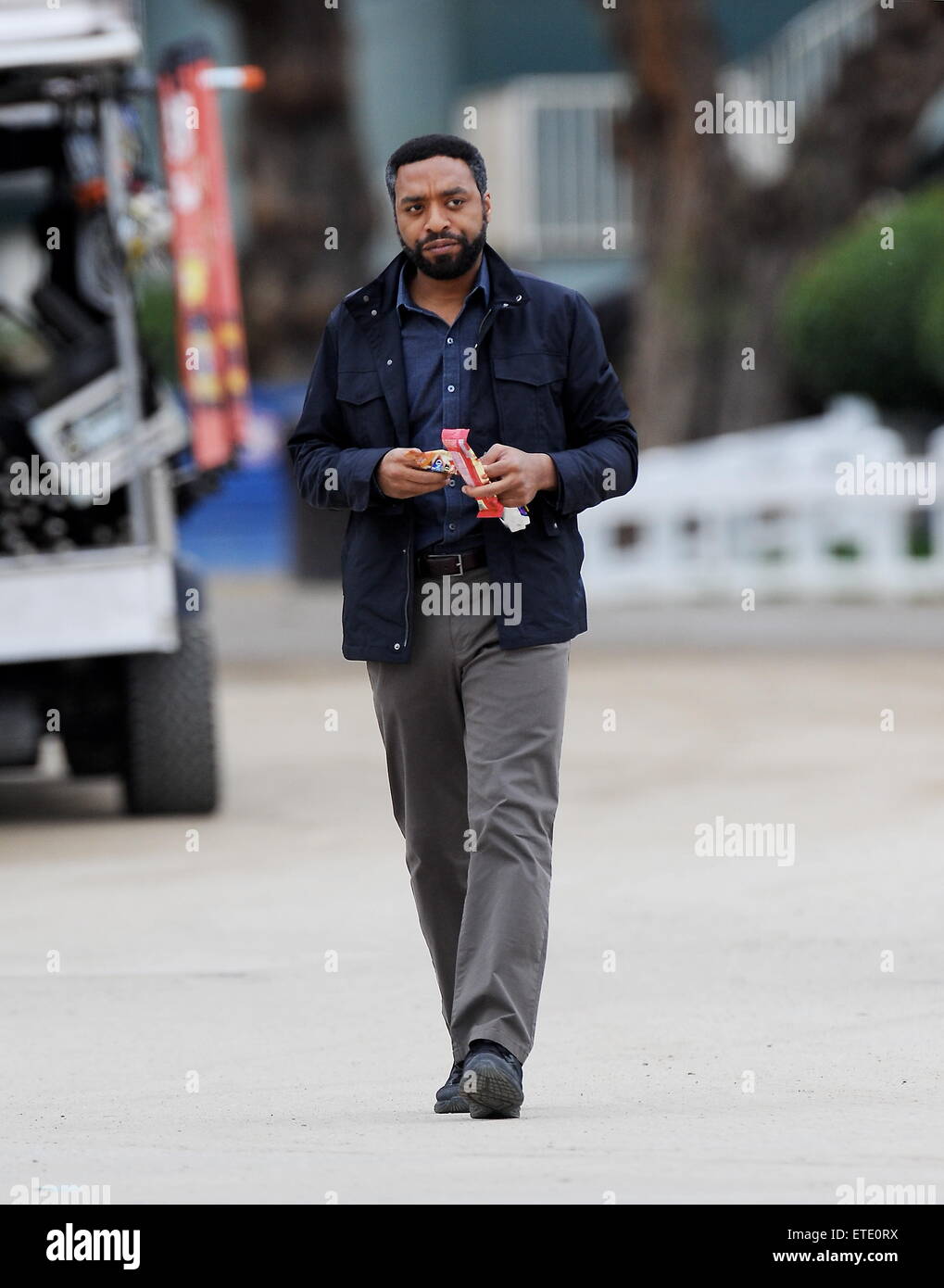 Oscar nominee "12 Years A Slave" star Chiwetel Ejiofor spotted on the set of "The Secret In Their Eyes" filming in Pasadena Ca. The actor was joined by co star Dean Norris from "Breaking Bad" and Daniel Moder as the cinematographer for the film. Daniel's famous wife Julia Roberts is also casted for the film.  Featuring: Chiwetel Ejiofor Where: Pasadena, California, United States When: 28 Jan 2015 Credit: Cousart/JFXimages/WENN.com Stock Photo